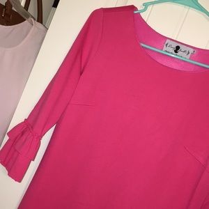 Coral/pink Dainty Jewell’s layering dress.